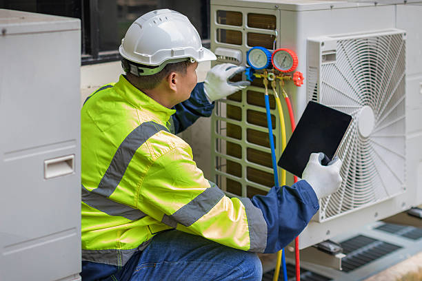 Professional Emergency Ac Repair technician working in Wappingers Falls, NY